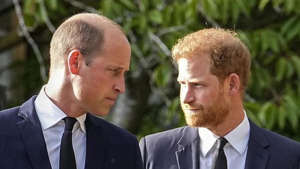 FILE - Britain's Prince William and Britain's Prince Harry walk beside each other after viewing the floral tributes for the late Queen Elizabeth II outside Windsor Castle, in Windsor, England, Saturday, Sept. 10, 2022. Prince Harry has said he wants to have his father and brother back and that he wants “a family, not an institution,” during a TV interview ahead of the publication of his memoir. The interview with Britain’s ITV channel is due to be released this Sunday. (AP Photo/Martin Meissner, File)