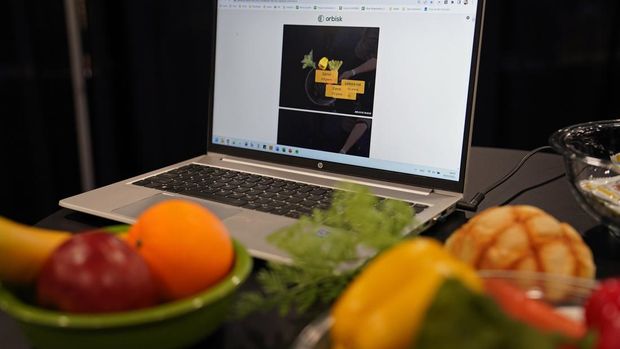 An image from the Orbisk food waste monitor is displayed on a computer during CES Unveiled, before the start of the CES tech show, Tuesday, Jan. 3, 2023, in Las Vegas. The device uses AI image recognition to track food as it is thrown away, displaying the data on a computer dashboard. (AP Photo/John Locher)