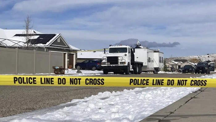 Police continue their investigation at a home where eight family members were found dead in Enoch, Utah, Thursday, Jan. 5, 2023. Officials said Michael Haight, 42, took his own life after killing his wife, mother-in-law and the couples five children. (AP Photo/Sam Metz)