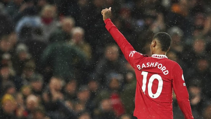 Manchester Uniteds Marcus Rashford celebrates after scoring his sides third goal during the English Premier League soccer match between Manchester United and Bournemouth at Old Trafford in Manchester, England, Tuesday, Jan. 3, 2023. (AP Photo/Dave Thompson)