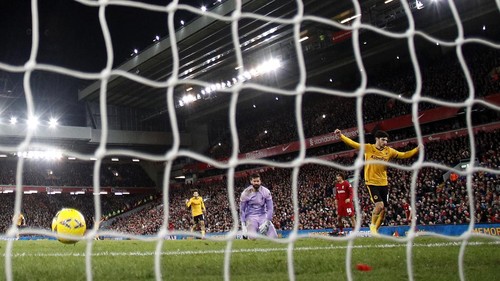 Soccer Football - FA Cup Third Round - Liverpool v Wolverhampton Wanderers - Anfield, Liverpool, Britain - January 7, 2023 Wolverhampton Wanderers Goncalo Guedes celebrates scoring their first goal as Liverpools Alisson looks dejected REUTERS/Phil Noble