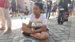 Sederet Gaya Bocah Saat Lomba Lato-lato di Sidoarjo