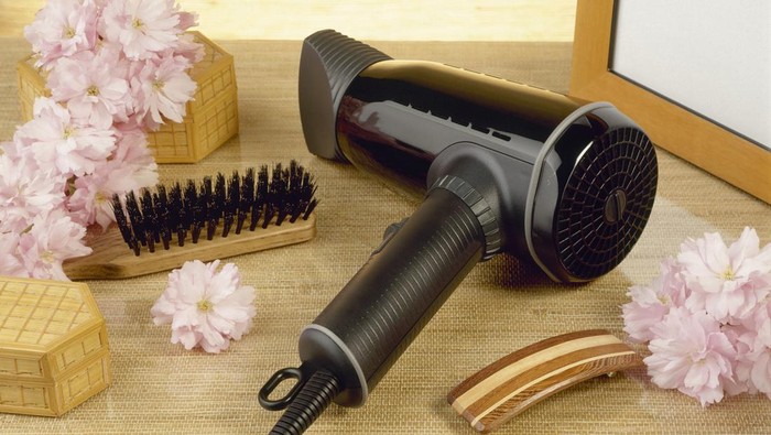 hairdryer and flowers in bathroom