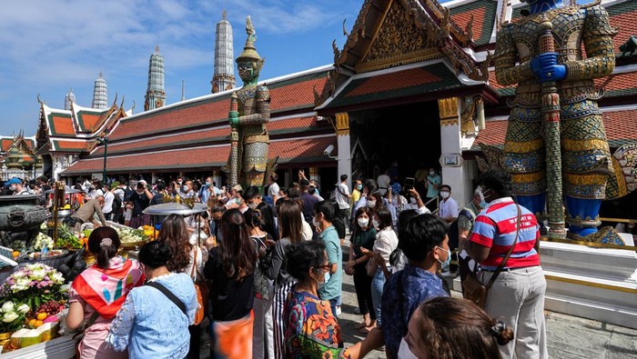 Tourists visit the Grand Palace, one of the top tourist attraction spots in Thailand