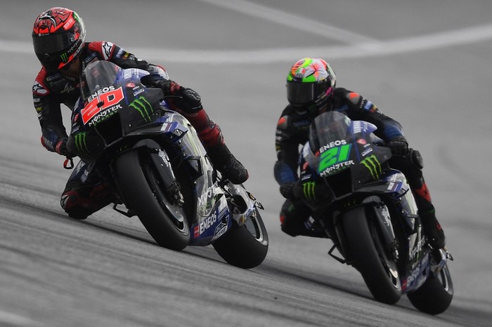 Monster Energy Yamahas French rider Fabio Quartararo (L) and Monster Energy Yamahas Italian rider Franco Morbidelli ride during the third free practice session of the MotoGP Austrian Grand Prix at the Redbull Ring racetrack in Spielberg on August 20, 2022. (Photo by VLADIMIR SIMICEK / AFP)