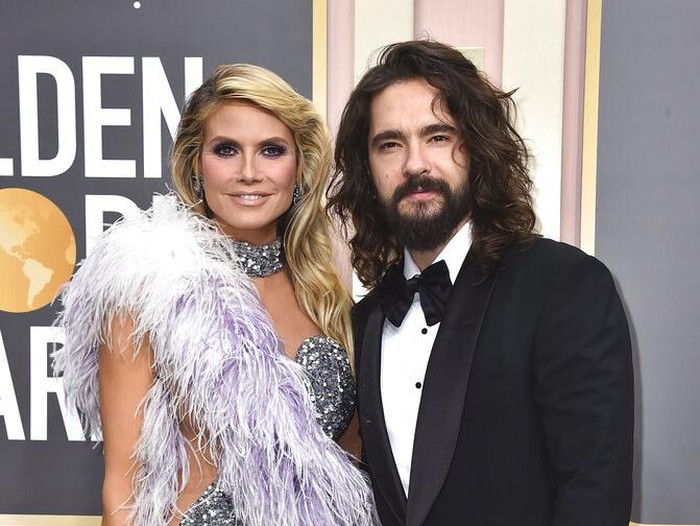 Heidi Klum, left, and Tom Kaulitz arrive at the 80th annual Golden Globe Awards at the Beverly Hilton Hotel on Tuesday, Jan. 10, 2023, in Beverly Hills, Calif. (Photo by Jordan Strauss/Invision/AP)