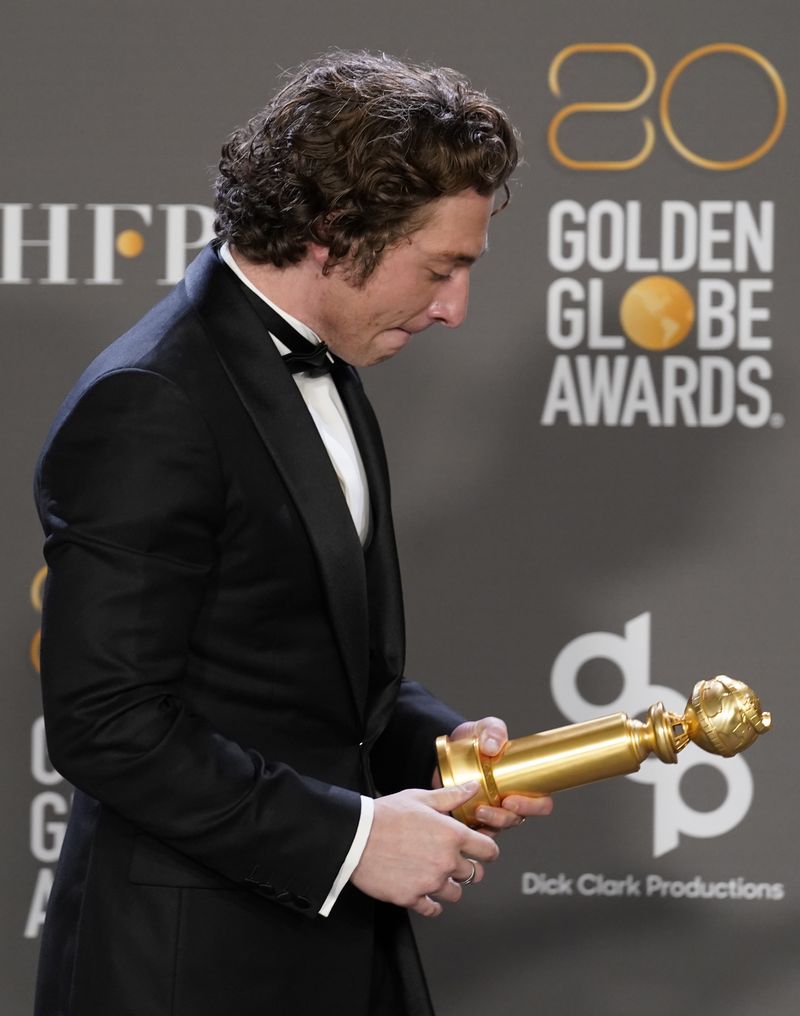 Jeremy Allen White poses in the press room with the award for best performance by an actor in a television series, musical or comedy for 