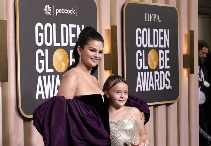 Selena Gomez, left, and Gracie Elliott Teefey arrive at the 80th annual Golden Globe Awards at the Beverly Hilton Hotel on Tuesday, Jan. 10, 2023, in Beverly Hills, Calif. (Photo by Jordan Strauss/Invision/AP)