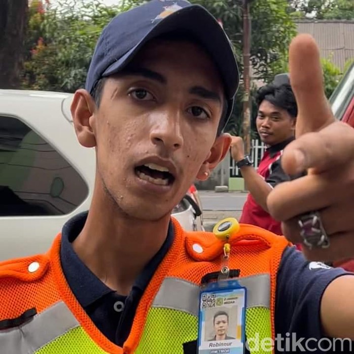 Jukir di Medan yang cekcok dengan warga gegara uang parkir.