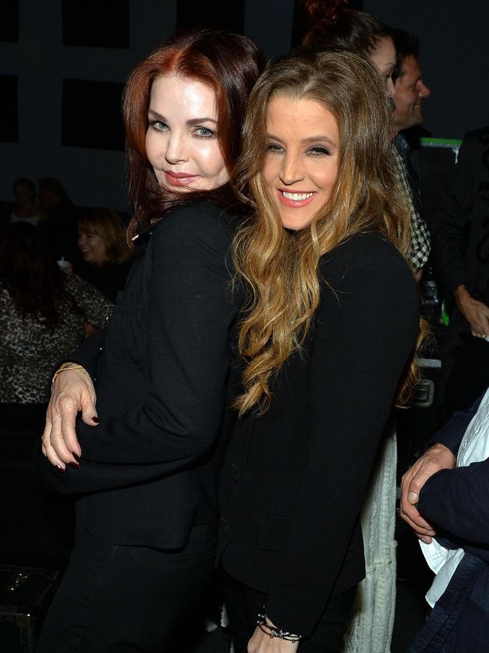 NASHVILLE, TN - SEPTEMBER 20:  (EXCLUSIVE ACCESS, SPECIAL RATES APPLY) Priscilla Presley celebrates backstage with her daughter Lisa Marie Presley after Lisa Maries performance at 3rd & Lindsley during the 14th Annual Americana Music Festival & Conference on September 20, 2013 in Nashville, United States.  (Photo by Rick Diamond/Getty Images for Americana Music Festival)