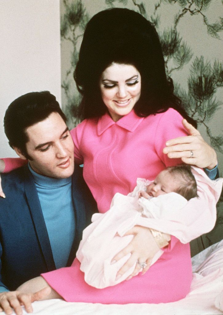 Elvis Presley and his wife, Priscilla, prepare to leave the hospital with their new daughter, Lisa Marie. Memphis, Tennessee, February 5, 1968.