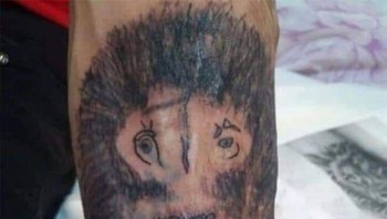 Tato singa yang tidak seperti singa. Foto: Wendy Louise McGrath via Bored Panda