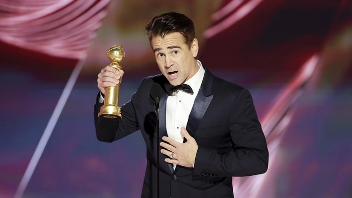 This image released by NBC shows Colin Farrell accepting the Best Actor in a Motion Picture – Musical or Comedy award for The Banshees of Inisherin during the 80th Annual Golden Globe Awards at the Beverly Hilton Hotel on Tuesday, Jan. 10, 2023, in Beverly Hills, Calif. (Rich Polk/NBC via AP)