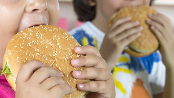 Boy And Girl With Hamburgers.  the t-shirt painted by himself