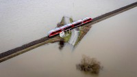 Sebuah kereta api melintas di kawasan Nidderau-Eichen, Frankfurt, Jerman, Senin (16/1/2023) waktu setempat.