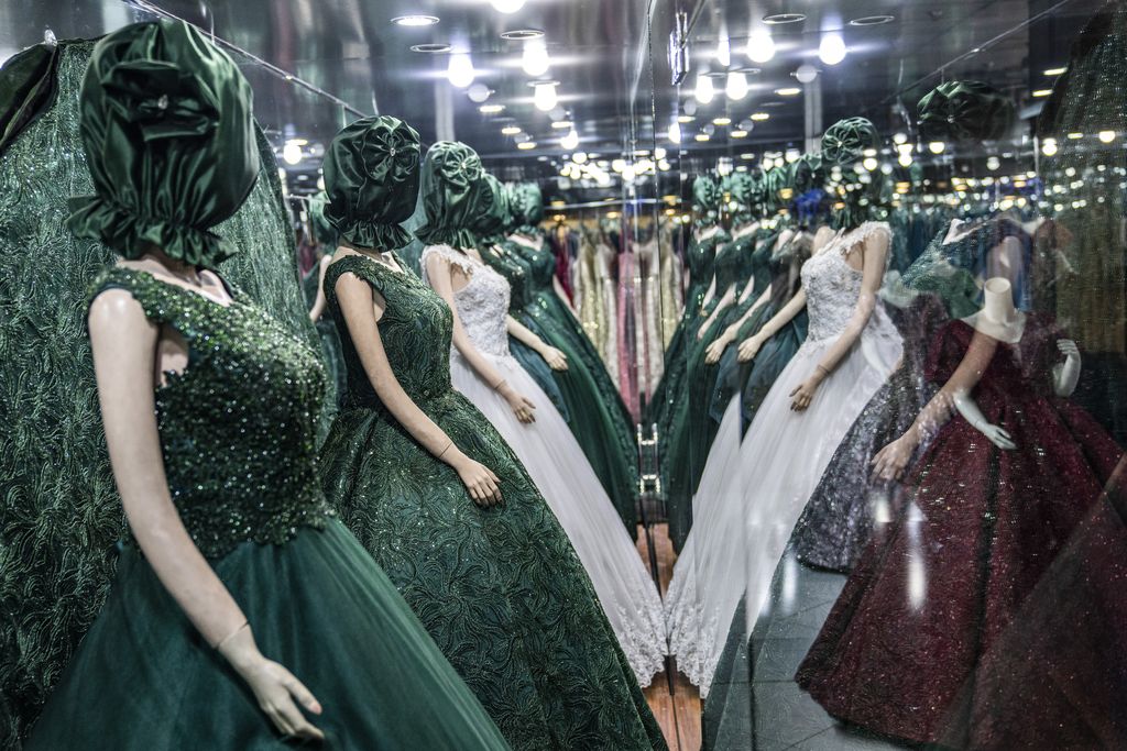 Mannequin's heads are covered in a wedding store in Kabul, Afghanistan, Monday, Dec. 26, 2022. Under the Taliban, the mannequins in women's dress shops across the Afghan capital Kabul are a haunting sight, their heads cloaked in cloth sacks or wrapped in black plastic bags. The hooded mannequins are one symbol of the Taliban's puritanical rule over Afghanistan (AP Photo/Ebrahim Noroozi)