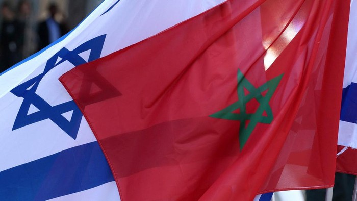 Israeli and Moroccan flags are pictured during an official ceremony in Israels Mediterranean coastal city of Tel Aviv, on September 13, 2022. (Photo by JACK GUEZ / AFP)
