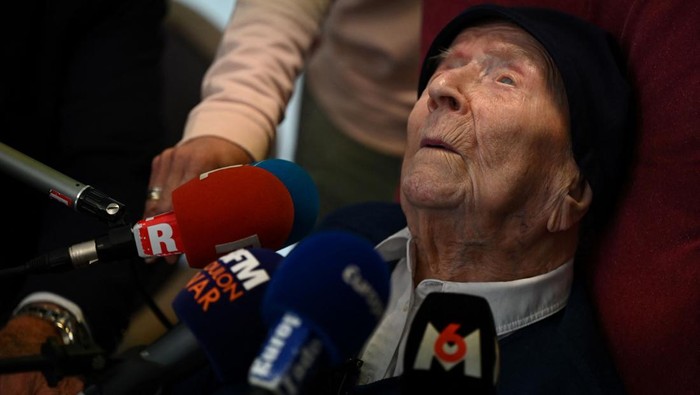 118 year-old French catholic nun Lucile Randon speaks to the press at the Saint-Catherine-Laboure nursing home where she lives in Toulon, southern France, on April 26, 2022, after becoming the worlds oldest known person following the death announced the day before of a Japanese woman one year her senior. - Lucile Randon, known as Sister Andre, was born in southern France on February 11, 1904, when World War I was still a decade away. (Photo by Christophe SIMON / AFP) / The erroneous mention[s] appearing in the metadata of this photo by Christophe SIMON has been modified in AFP systems in the following manner: [Lucile Randon] instead of [Andre Randon]. Please immediately remove the erroneous mention[s] from all your online services and delete it (them) from your servers. If you have been authorized by AFP to distribute it (them) to third parties, please ensure that the same actions are carried out by them. Failure to promptly comply with these instructions will entail liability on your part for any continued or post notification usage. Therefore we thank you very much for all your attention and prompt action. We are sorry for the inconvenience this notification may cause and remain at your disposal for any further information you may require. (Photo by CHRISTOPHE SIMON/AFP via Getty Images)