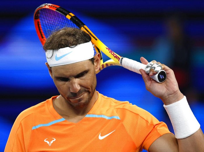Rafael Nadal of Spain reacts during his second round match against Mackenzie McDonald of the U.S., at the Australian Open tennis championship in Melbourne, Australia, Wednesday, Jan. 18, 2023. (AP Photo/Asanka Brendon Ratnayake)