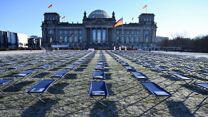 A general view of camp beds, during a protest action with claims of more expansion of biomedical research related to post-COVID-19 long-term conditions in front of the Reichstag building, the seat of the lower house of parliament Bundestag in Berlin, Germany January 19, 2023. REUTERS/Annegret Hilse