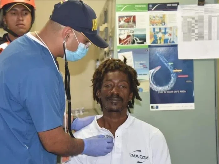 Elvis Francois, shown here being checked by a doctor after his rescue on the Caribbean Sea, says he survived 24 days living on ketchup, stock cubes and garlic powder © - / Colombian National Navy/AFP