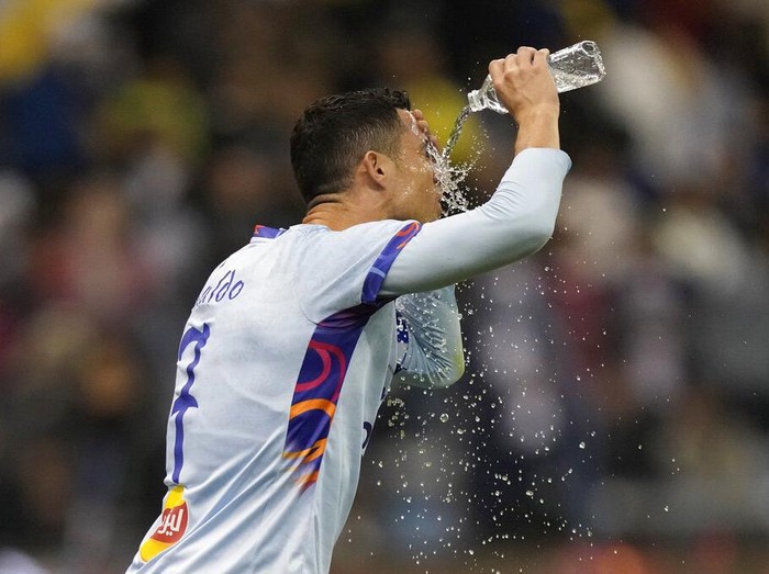 Cristiano Ronaldo celebrates after scoring his side's second goal playing for a combined XI of Saudi Arabian teams Al Nassr and PSG during a friendly soccer match, at the King Saud University Stadium, in Riyadh, Saudi Arabia, Thursday, Jan. 19, 2023. (AP Photo/Hussein Malla)