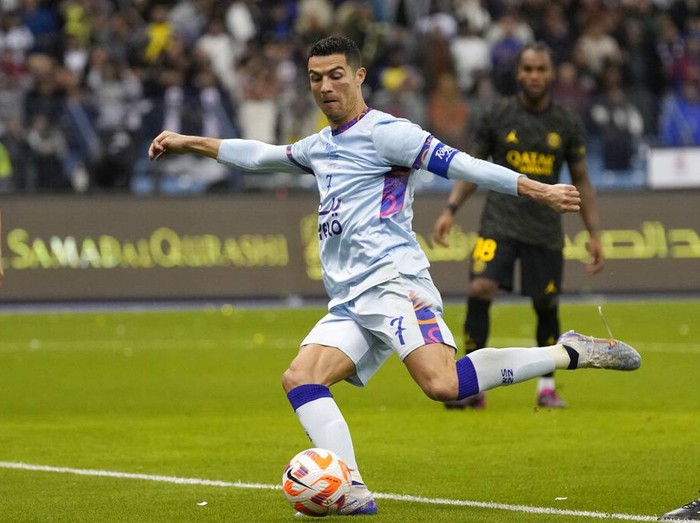 Cristiano Ronaldo celebrates after scoring his side's second goal playing for a combined XI of Saudi Arabian teams Al Nassr and PSG during a friendly soccer match, at the King Saud University Stadium, in Riyadh, Saudi Arabia, Thursday, Jan. 19, 2023. (AP Photo/Hussein Malla)