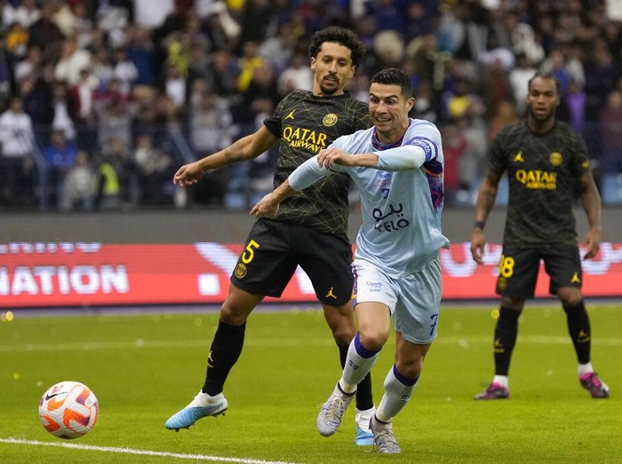 Cristiano Ronaldo celebrates after scoring his side's second goal playing for a combined XI of Saudi Arabian teams Al Nassr and PSG during a friendly soccer match, at the King Saud University Stadium, in Riyadh, Saudi Arabia, Thursday, Jan. 19, 2023. (AP Photo/Hussein Malla)