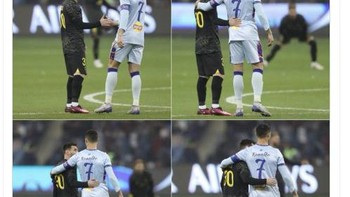 Tak hanya di lorong pemain, Ronaldo dan Messi saling rangkul di lapangan. Foto: Twitter