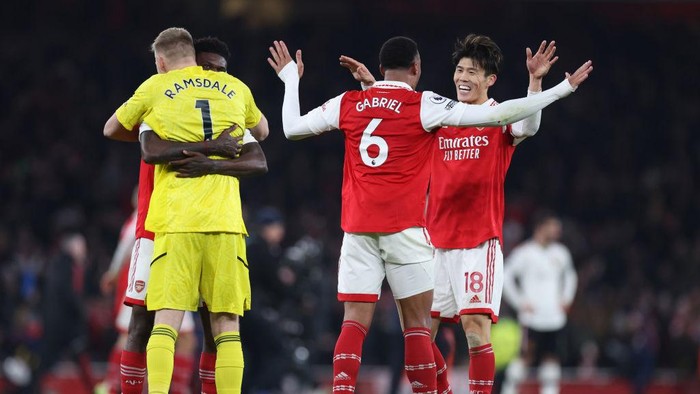 LONDON, ENGLAND - JANUARY 22: Takehiro Tomiyasu of Arsenal celebrates with Gabriel following the Premier League match between Arsenal FC and Manchester United at Emirates Stadium on January 22, 2023 in London, England. (Photo by Catherine Ivill/Getty Images)