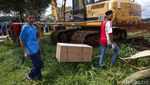 Proses Relokasi Makam yang Ada di Tengah Lahan Proyek Perumahan Depok