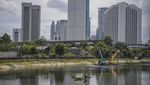 Antisipasi Banjir, Lumpur di Waduk Melati Dikeruk