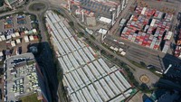 Foto udara memperlihatkan ribuan kontainer tempat isolasi COVID di Hong Kong, China, Selasa (22/1/2023).