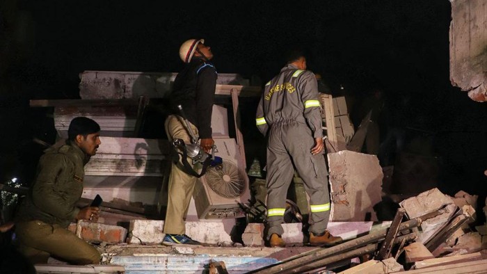 LUCKNOW, INDIA - JANUARY 24: A multi storey building collapsed in Lucknow Wazir Hasan road, heart of the city on Tuesday evening, on January 24, 2023 in Lucknow, India. Several people are feared trapped inside the debris of a multi-story building which collapsed in Lucknow's Wazir Hassan area on Tuesday. Two JCB machines and a team from state disaster relief force (SDRF) are at the spot to clear the debris and carry out the rescue operation. (Photo by Deepak Gupta/Hindustan Times via Getty Images)