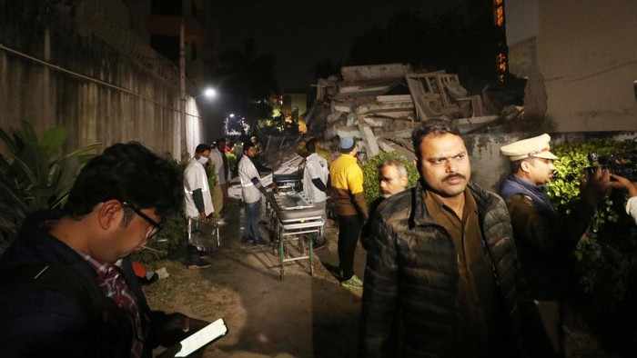 LUCKNOW, INDIA - JANUARY 24: A multi storey building collapsed in Lucknow Wazir Hasan road, heart of the city on Tuesday evening, on January 24, 2023 in Lucknow, India. Several people are feared trapped inside the debris of a multi-story building which collapsed in Lucknow's Wazir Hassan area on Tuesday. Two JCB machines and a team from state disaster relief force (SDRF) are at the spot to clear the debris and carry out the rescue operation. (Photo by Deepak Gupta/Hindustan Times via Getty Images)