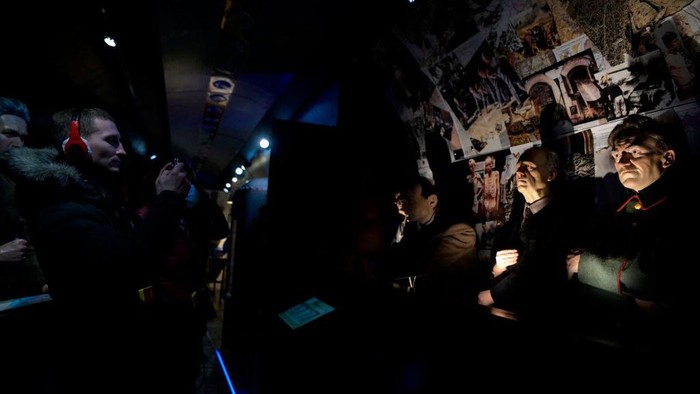 Visitors tour the Victory Train - an immersive train-based moving exhibition dedicated to World War Two, at Moscow's Belorussky railway station on January 23, 2023. (Photo by Natalia KOLESNIKOVA / AFP) (Photo by NATALIA KOLESNIKOVA/AFP via Getty Images)