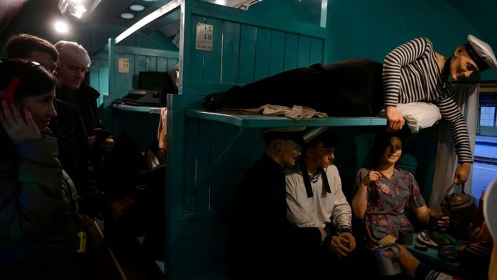 Visitors tour the Victory Train - an immersive train-based moving exhibition dedicated to World War Two, at Moscow's Belorussky railway station on January 23, 2023. (Photo by Natalia KOLESNIKOVA / AFP) (Photo by NATALIA KOLESNIKOVA/AFP via Getty Images)