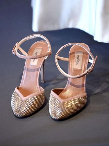 WINDSOR, ENGLAND - SEPTEMBER 23: HRH Princess Beatrice of York's wedding shoes and wedding dress on display at Windsor Castle on September 23, 2020 in Windsor, England. Princess Beatrice and Edoardo Mapelli Mozzi married on July 18, 2020 in Windsor. The wedding dress, first worn by Her Majesty The Queen in the 1960s, will go on public display at Windsor Castle from Thursday, 24 September 2020. (Photo by Karwai Tang/WireImage)