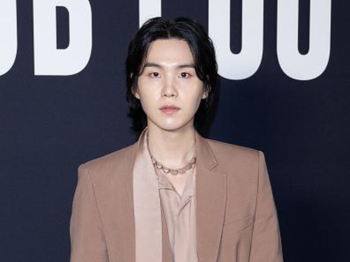 PARIS, FRANCE - JANUARY 25: (EDITORIAL USE ONLY - For Non-Editorial use please seek approval from Fashion House) Suga attends the Valentino Haute Couture Spring Summer 2023 show as part of Paris Fashion Week  on January 25, 2023 in Paris, France. (Photo by Stephane Cardinale - Corbis/Corbis via Getty Images)