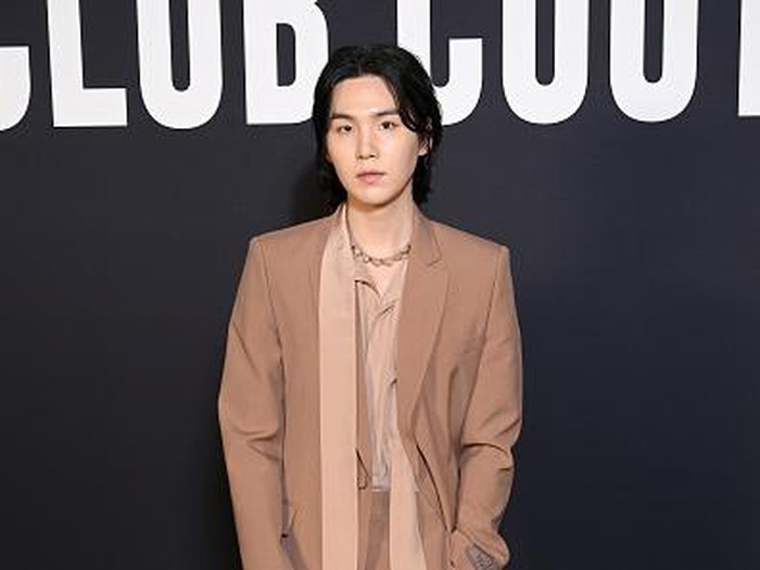PARIS, FRANCE - JANUARY 25: (EDITORIAL USE ONLY - For Non-Editorial use please seek approval from Fashion House) Suga attends the Valentino Haute Couture Spring Summer 2023 show as part of Paris Fashion Week  on January 25, 2023 in Paris, France. (Photo by Stephane Cardinale - Corbis/Corbis via Getty Images)