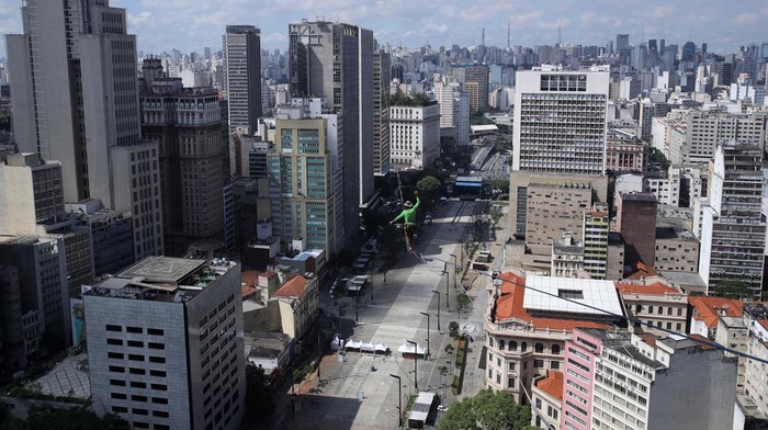 Rafael Bridi balances on a highline at 114 meters high and 510 meters long in an attempt to break a record for the longest walk in the Americas, in Sao Paulo, Brazil January 25, 2023. REUTERS/Carla Carniel