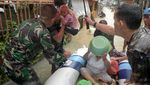 Potret Evakuasi Warga Korban Banjir di Manado