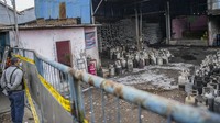 Kebakaran yang melanda satu unit bangunan agen gas elpiji tersebut diduga karena kebocoran gas.