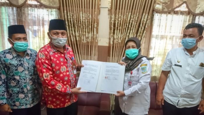 DPPKB saat MOU dengan Kemenag soal cegah stunting. (Foto: Istimewa)
