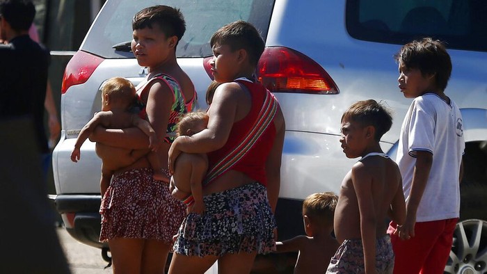 Yanomamis rest in hammocks at the Santo Antonio Children's Hospital, in Boa Vista, Roraima state, Brazil, Thursday, Jan 26, 2023. Brazil's government declared a public health emergency for the Yanomami people in the Amazon, who are suffering from malnutrition and diseases such as malaria. (AP Photo/Edmar Barros)