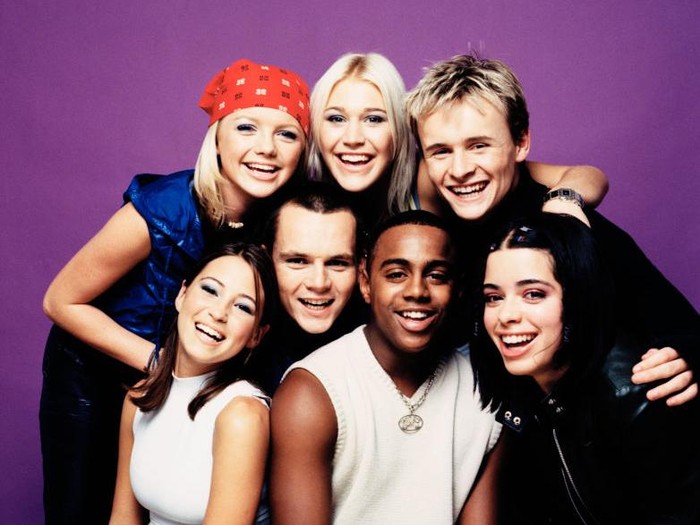 S Club 7 British pop group S Club 7, circa 2000. They are Jo OMeara, Hannah Spearritt, Rachel Stevens, Tina Barrett, Paul Cattermole, Jon Lee and Bradley McIntosh. (Photo by Tim Roney/Getty Images)