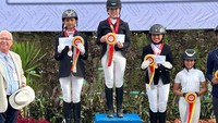 Victoria menyabet dua podium di kelas tunggang serasi (Dressage) di hari pertama menduduki posisi 1.