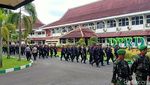Penampakan Massa Coret Foto Paludan-Bendera Swedia di Demo Bela Al-Quran