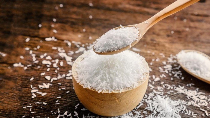 mono sodium glutamate (MSG) or seasoning ,gourmet powder on wooden table
