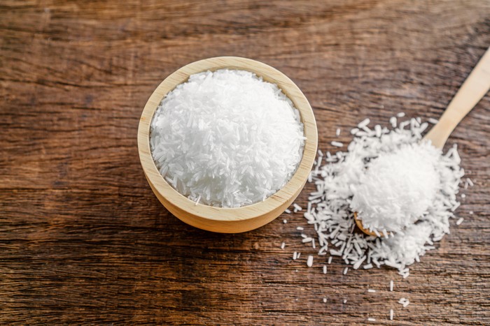 mono sodium glutamate (MSG) or seasoning ,gourmet powder on wooden table